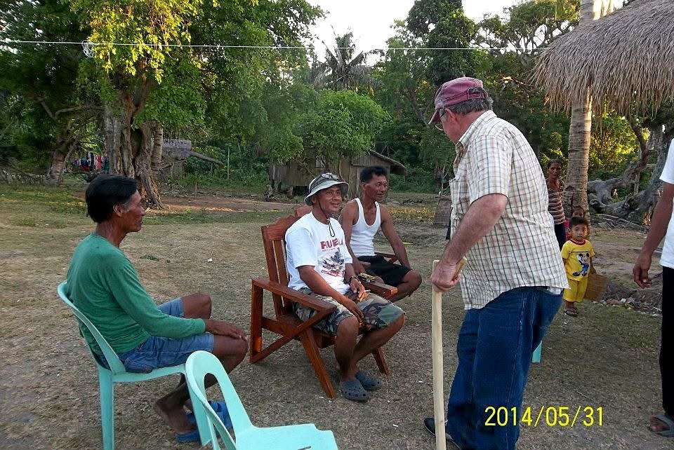 Village officials . The cane was made back at the half way point by Bro,Mario Agraba